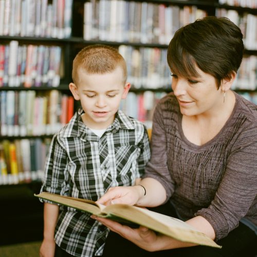 Women Teaching the Kid to Read