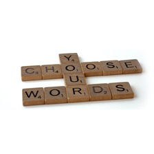 Scrabble tiles scattered on a table