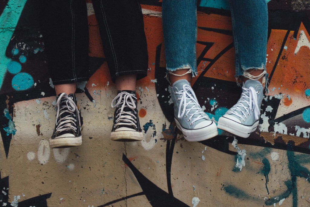 Two individuals in sneakers