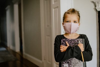 A Girl Wearing a Face Mask