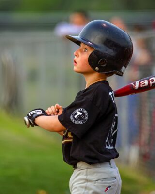 YOUNG BASEBALL PLAYER