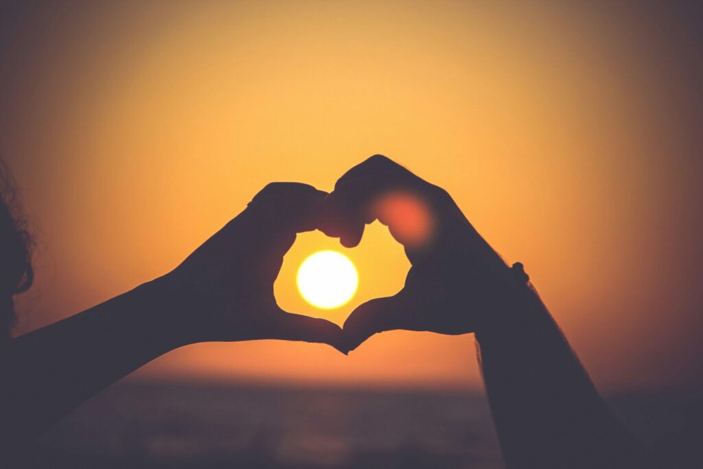 HEART SIGN WITH HANDS AND SUN
